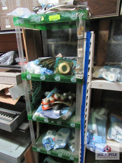 shelf w plumbing supplies