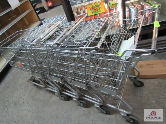 4 silver shopping carts