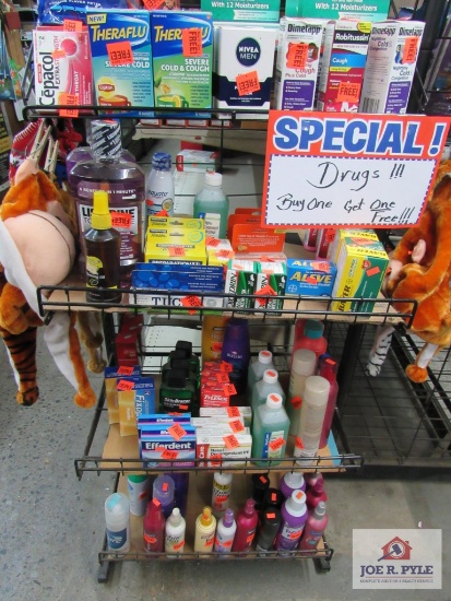2 ft shelf w contents cough drops, Tylenol, mouthwash, hair care products, etc.