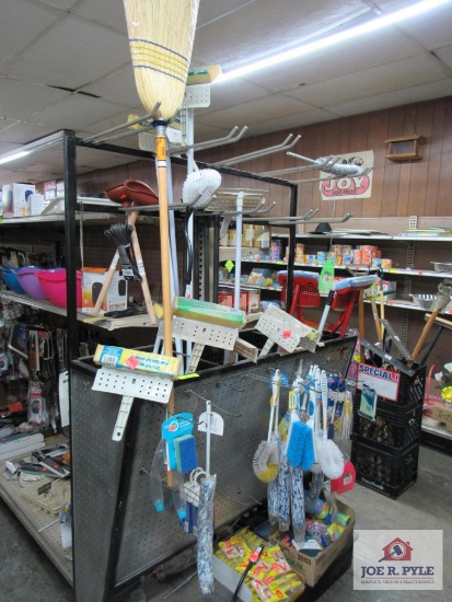 4 ft shelf and contents mops, brooms, etc.