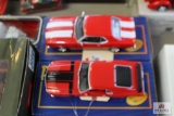 2 Diecast metal cars: 1970 Ford Mustang 302 boss and 1968 Chevy Camaro Z28
