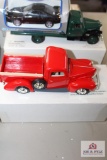 3 Diecast metal cars: 1940 Ford pickup, 1941 Chevy pickup, 1999 Ford Mustang