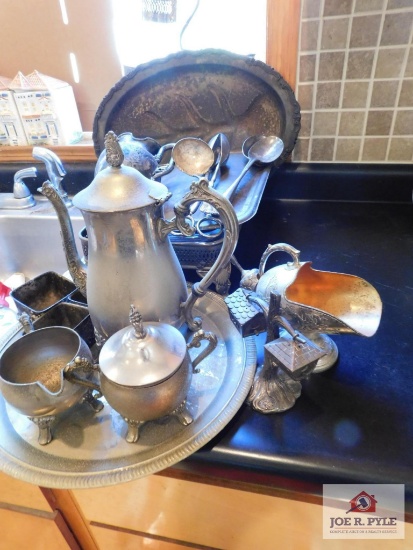 Collection of silver plate items - serving trays, pitchers, creamer & sugar, spoons & utensils