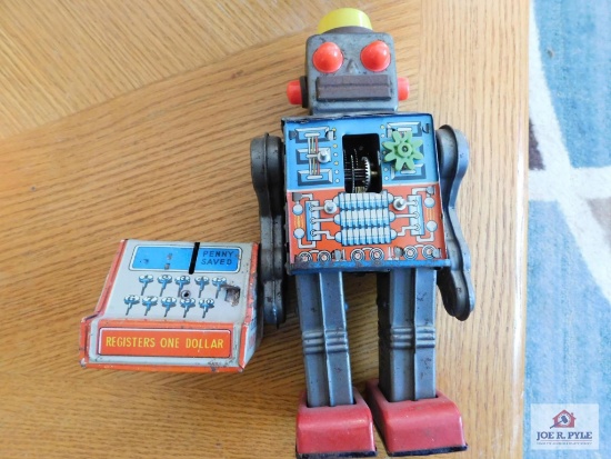 Antique metal robot toy and penny bank