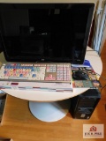 HP desktop monitor with Logic keyboard, monitors and table