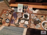 Collection of rocks, geodes and crystals with books