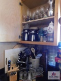 Contents of cabinets and countertop - kitchen utensils, knife blocks, cutting boards, canisters,