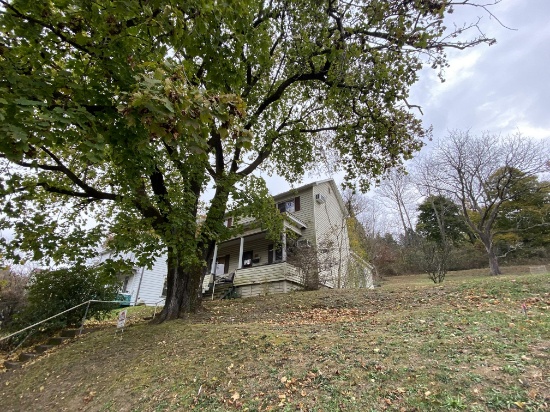 2-Story Home Sold to the Highest Bidder