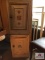 Two metal Home Comfort bead and pie cabinets