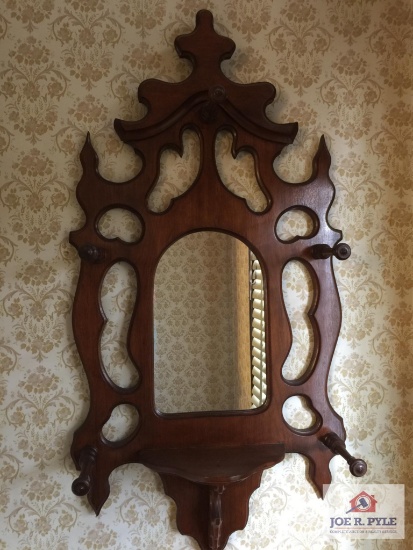 Early wall hanging coat rack