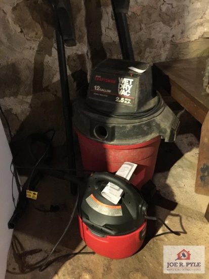 Two Craftsman shop vacs