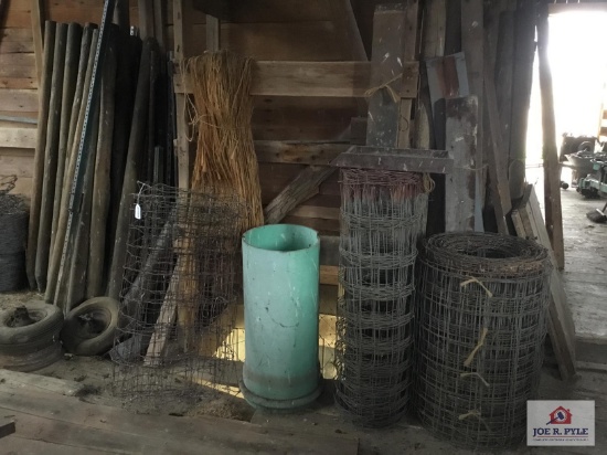 Lot in corner: wood fence posts, metal fencing, twine, etc.