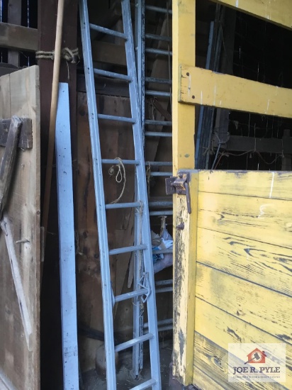 Two extension ladders, one at least 20 feet