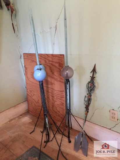 Three antique lightening rods, balls