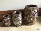 Three stoneware crocks decorated with broken china pieces