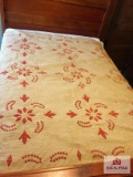 Very early red and white hand stitched quilt (has damage and has yellowed)