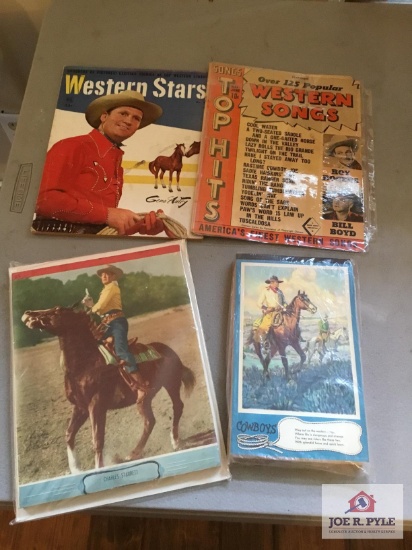 Lot Western theme items: Charles Starrett and Cowboys tablets, Gene Autry song book, etc.