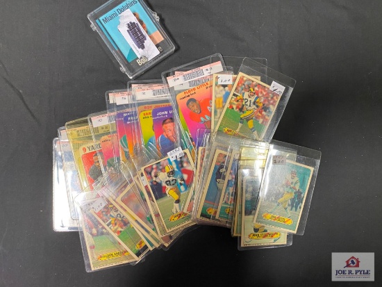 1970-80's Football insert lot: 25 assorted 1983 Topps stickers, 11 Topps 1970's shiny inserts, etc.