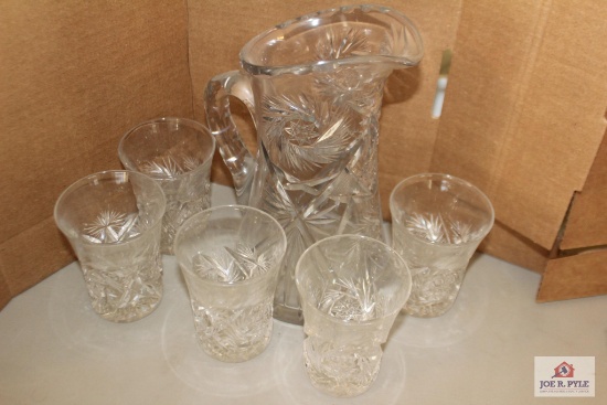 Pressed glass pitcher and glasses