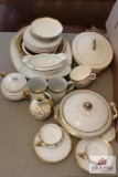 Collection of gold trimmed china pieces and 2 Donatello cups and saucers