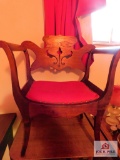 Antique chair with cutout back