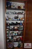 8 shelves of Avon bottles and knick knacks