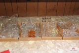 Large group of pressed glass items, sugars, creamers, bowls and glasses