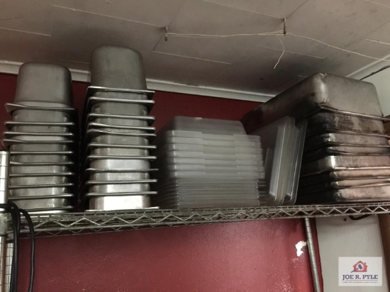 Lot of metal and plastic storage containers and metal shelf