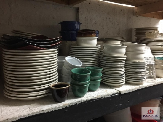 Lot of restaurant dishes and serving pieces