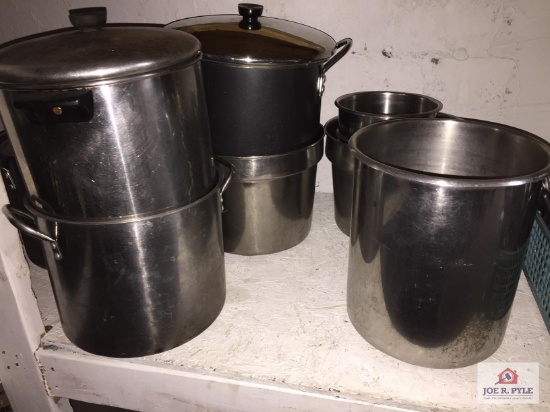 Lot of eight stock pots and lids