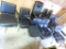 Large collection of black chairs