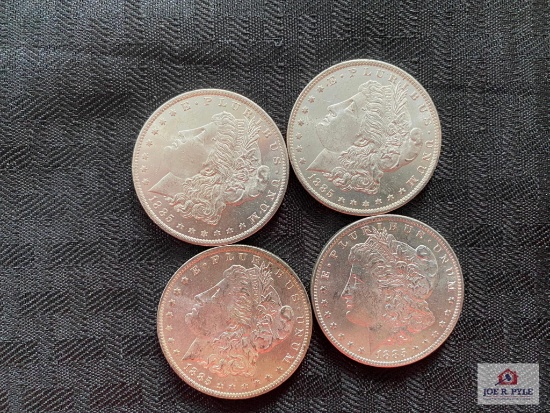 Lot of (4) 1885-O US Morgan Silver Dollars