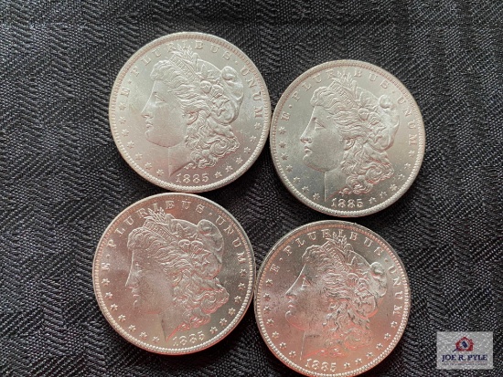 Lot of (4) 1885-O US Morgan Silver Dollars