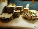 A collection of Franciscan dinner & salad plates, bowls, cups and platter