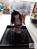 Japanese doll in case