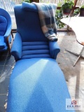 Reclining chair with throw