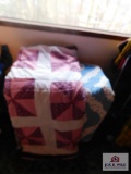 2 Machine stitched quilts and luggage rack