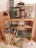 Shelf and contents, pictures, shelves, tea set and shoe shine kit