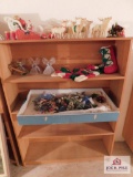 Shelf and contents of vintage Christmas decorations