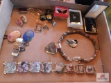 Bracelets, necklaces and pins