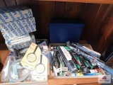 Collection of new magnifying glasses, Parker pens in containers, umbrellas and jar openers