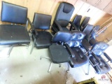 Large collection of black chairs