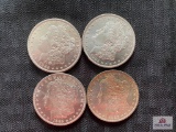 Lot of (4) 1885-O US Morgan Silver Dollars