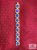 Women's Gold Toned Bracelet W/ Blue Stones