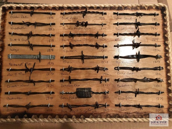 Barbed wire display board