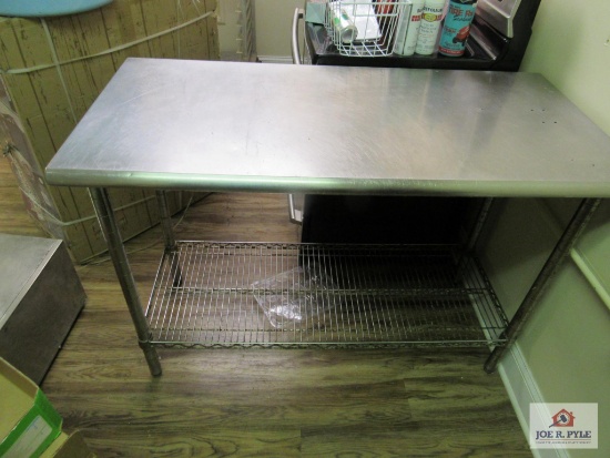 Stainless steel table 2 ft wide, 4 ft long, 36 inches tall