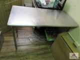 Stainless steel table 2 ft wide, 4 ft long, 36 inches tall