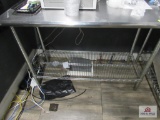 Stainless steel table 2 ft wide, 4 ft long, 35 inches tall
