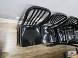 4 black aluminum chairs