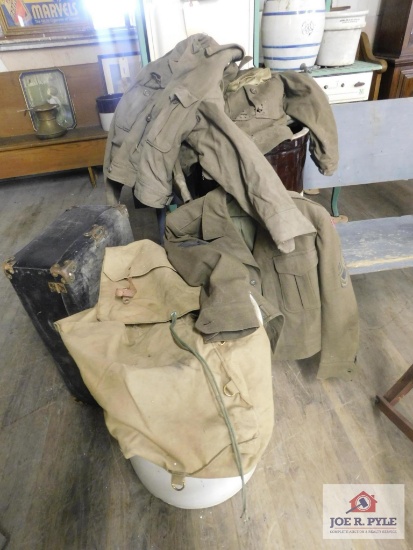 Vintage Army jackets and suitcase